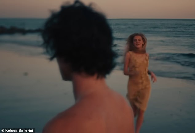 The couple was seen in a number of fleeting moments in the video. At one point, the songbird was seen running on the beach into the arms of her shirtless lover