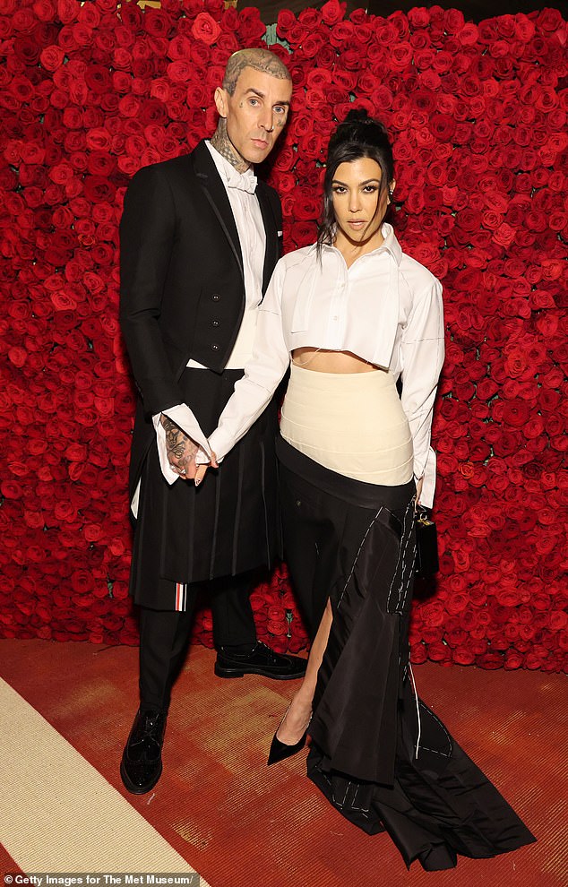 Kourtney Kardashian didn't find the inappropriate Diddy joke at her stepson's birthday party funny in the least; (Travis Barker and Kourtney in 2022)