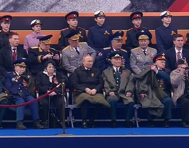 Putin looks weak as he sits with a blanket on his lap during the 2022 Russian Victory Day Parade