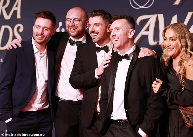 Producers of their hit breakfast show (pictured) collected the gong on their behalf