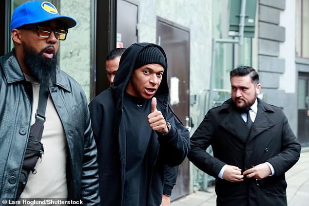 Kylian Mbappe, 25, was seen leaving the swanky Bank hotel where he was staying during his whistle-stop trip to Stockholm, Sweden last week