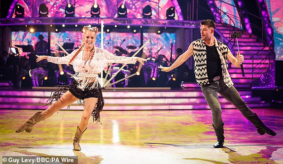 EMBARGOED UNTIL SATURDAY OCTOBER 12, 2020 For use in the United Kingdom, Ireland or Benelux only. BBC handout photo of Tasha Ghouri and Aljaz Skorjanec, during the dress rehearsal for Saturday's Strictly Come Dancing show on BBC1. Date of photo: Saturday, October 12, 2024. PA Photo. See PA story SHOWBIZ Strictly. Photo credit should read: Guy Levy/BBC/PA Wire. EDITOR'S NOTE: Not for use more than 21 days after release. You may use this photograph free of charge only for the purpose of publishing or reporting on current BBC programmes, staff or other BBC output or activities within 21 days of issue. Any use after that time MUST be approved through BBC Picture Publicity. Please pass the image on to the BBC and any credited photographer or independent program maker as described in the caption.