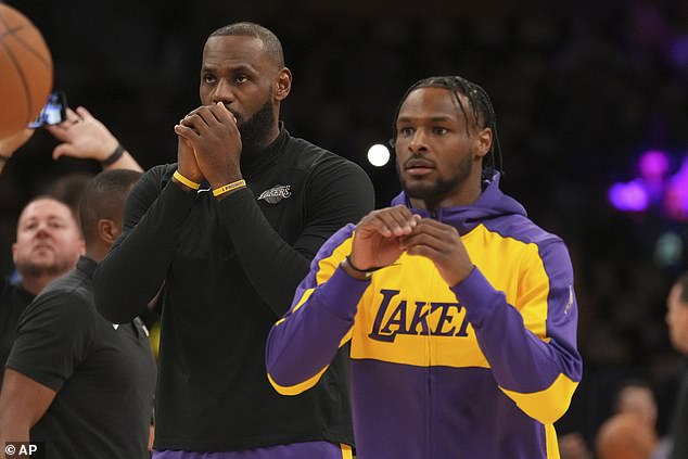 Los Angeles Lakers forward LeBron James, left, and guard Bronny James warm up Tuesday