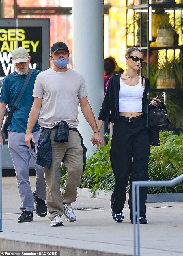 Leonardo DiCaprio and his girlfriend Vittoria Ceretti showed some rare PDA on Wednesday as they enjoyed a romantic, hand-in-hand stroll through New York City