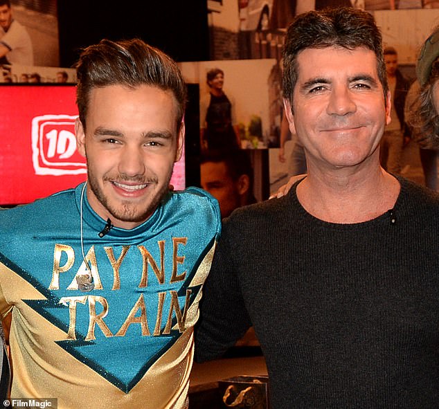 Liam Payne and Simon Cowell in 2013. The two men had little to do with each other after the One Direction boys went their separate ways