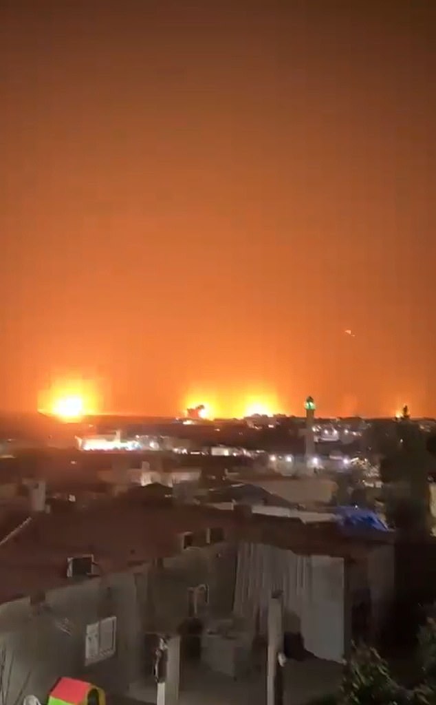 Dramatic footage shows rockets exploding near Tel Aviv