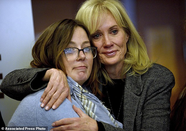 Alexandra Eckersley, who was convicted on charges of abandoning her newborn baby in the woods, hugs her mother, Nancy Eckersley, after her sentence was suspended