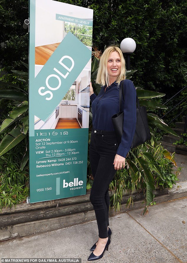 A major bank blames existing lending rules for stopping young Australians from buying their first home (pictured is a Sydney homebuyer)