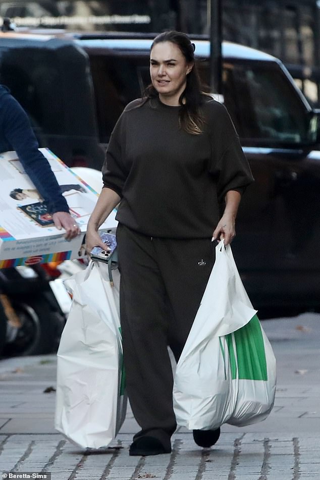 Tamara Ecclestone threw the money this week when she was spotted loaded down with bags and boxes after enjoying a day of shopping at Peter Jones in Chelsea