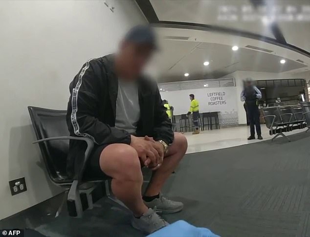 The AFP intercepted a Victorian man, 47, after he failed to pass through security at Perth Airport at 11.30pm on September 17 (officer bodycam footage pictured)