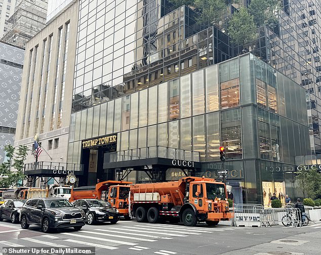 A man plunged 50 feet into New York's Trump Tower in front of shocked visitors lunching at the footpath