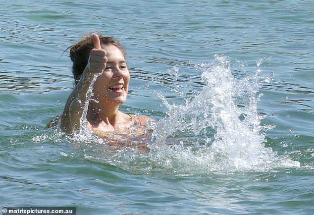 The royal looked at ease as she enjoyed a dip in the fresh sea