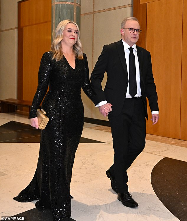 New polls have shown that Prime Minister Anthony Albanese's Labor Party (pictured with fiancée Jodie Haydon) has fallen behind the Coalition in the two-party preferential vote