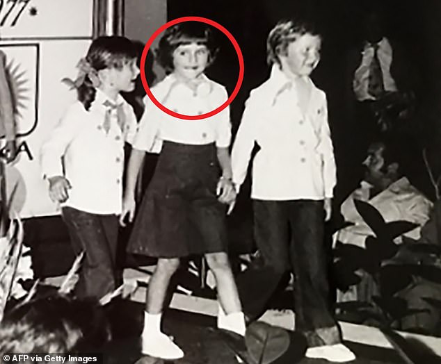 Melania Trump (circled, center right) started modeling at the age of six. She is photographed during a fashion review for Jutranjka, the textile company where her mother worked. She writes about a happy childhood behind the Iron Curtain in Slovenia