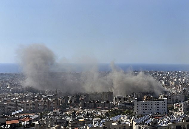 Smoke rises after Israeli airstrikes on Dahiyeh in Beirut, Lebanon, Thursday