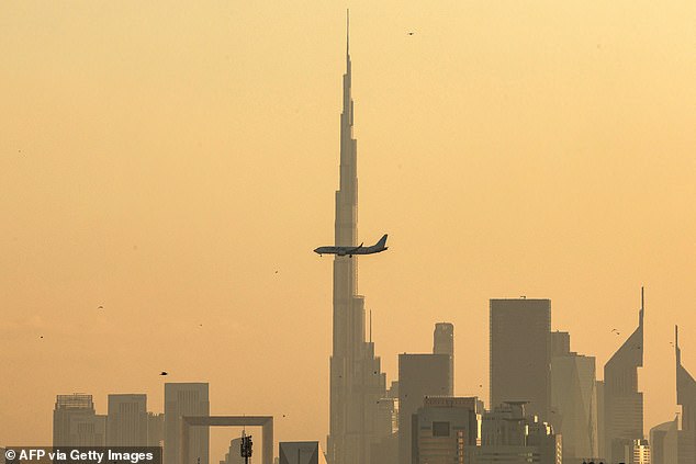 Flights to and from Dubai (pictured) have been canceled today and tomorrow amid fears Israel could launch a missile attack on Iran