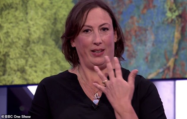 Miranda Hart has revealed she broke up with her husband before his romantic proposal in Kew Gardens (pictured showing off her wedding ring on The One Show on Tuesday night)