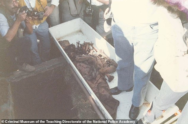 The remains of the infamous 'Angel of Death' Josef Mengele are lifted from the ground in June 1985 in a small cemetery in the town of Embu, 27 kilometers from Sao Paulo.