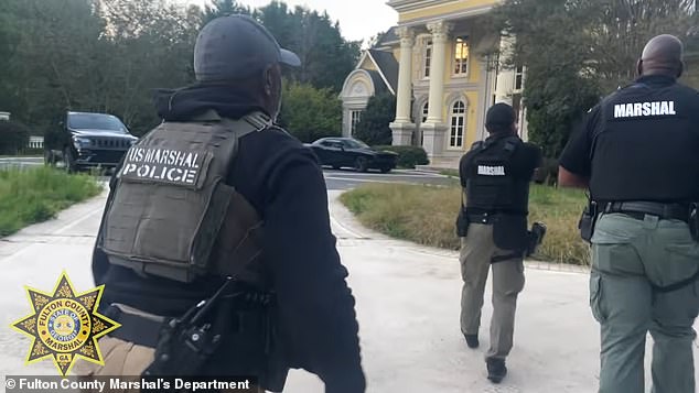 A group of people who have been squatting in a sprawling mansion in Atlanta have finally been evicted, almost a year after moving in