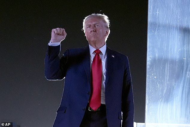 Republican presidential candidate, former President Donald Trump, gestures as he concludes his speech during a campaign event at the Butler Farm Show, Saturday, October 5, 2024,