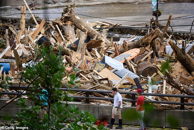 In Lake Lure, North Carolina, approximately six feet of debris piled up on a bridge from Lake Lure to Chimney Rock, blocking access