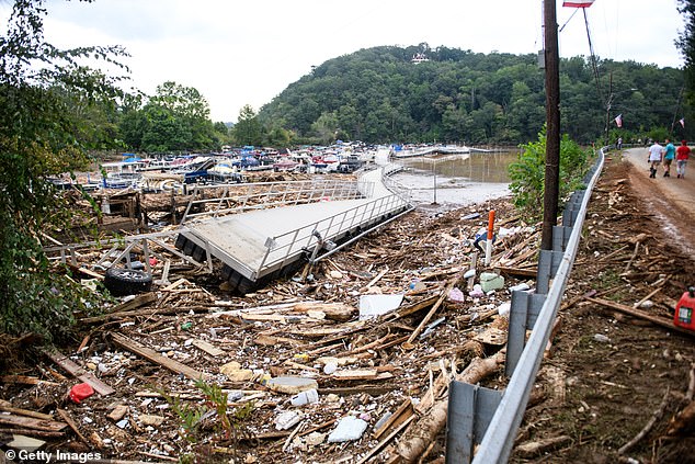 The Rocky Broad River flows into Lake Lure and now floods the town with debris from Chimney Rock, North Carolina after heavy rains from Hurricane Helene