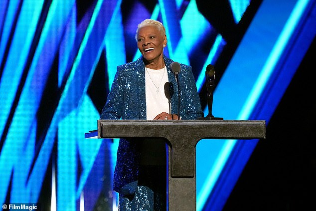 Dionne Warwick, 83, is weighing in on the viral video in which a man appeared to push 27-year-old Brittany Broski as she danced to Charli XCX's popular song Apple. Pictured this weekend at the Rock and Roll Hall of Fame at Rocket Mortgage Fieldhouse in Cleveland