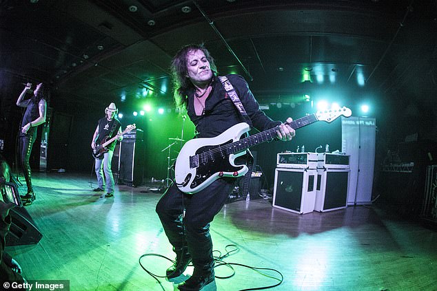 Jake E. Lee, former guitarist for Ozzy Osbourne, is pictured on stage in 2014