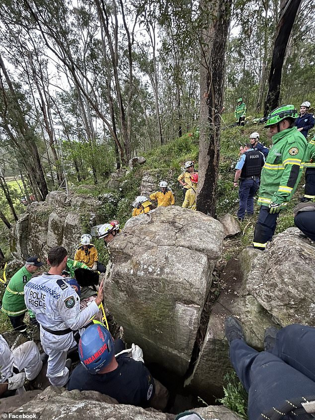 Emergency services tried for seven hours to free the woman