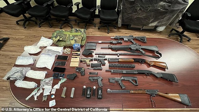 Pictured: Law enforcement weapons and drugs reportedly seized by Peckerwoods gang