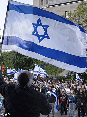 The Israeli flag is blue and white with two lines and the Star of David in the center