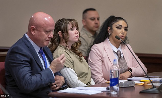 A judge has upheld an involuntary manslaughter conviction against movie gun maker Hannah Gutierrez-Reed (center) in the fatal shooting of a cameraman by Alec Baldwin