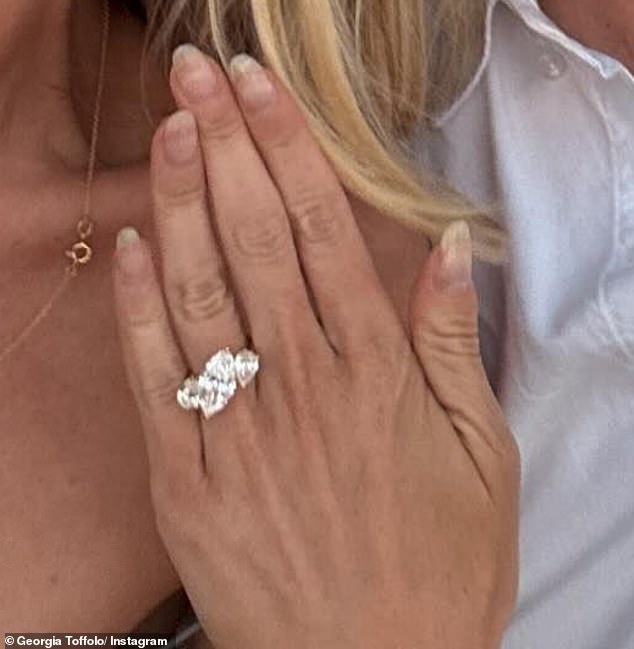 Georgia's stunning diamond-studded engagement ring was unveiled on social media on Sunday morning