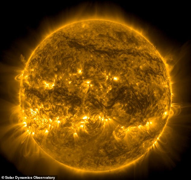 On September 29, the Sun caused a large coronal mass ejection (pictured), which will hit Earth with a glancing blow later today.