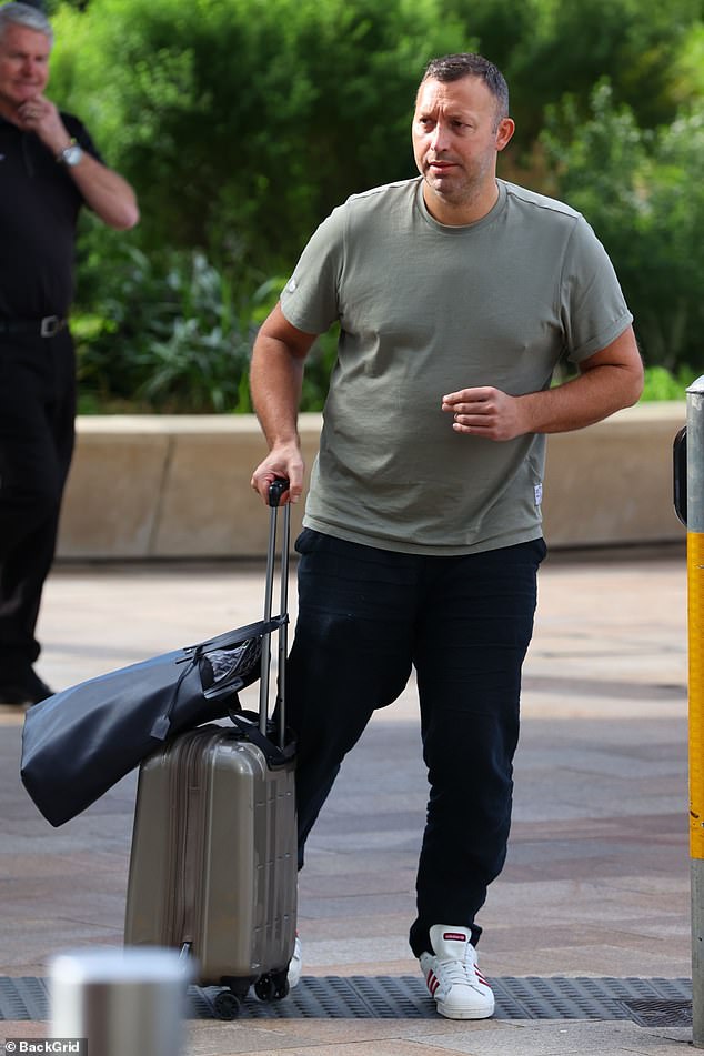 Ian Thorpe is pictured at Sydney Airport earlier this week, shortly after taking a big hit in the hip pocket over a piece of real estate