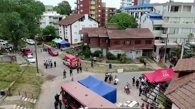 Drone footage shows rescue efforts on the ground in Argentina today after a hotel collapsed