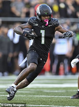 Traeshon Holden #1 of the Oregon Ducks controls the ball during the second quarter of the game against the Ohio State Buckeyes at Autzen Stadium on October 12, 2024 in Eugen