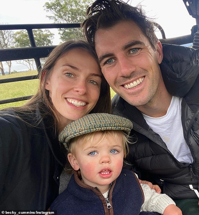 Pat Cummins regrets not spending more time at home after the birth of his first child Albie (pictured with Cummins and wife Becky)