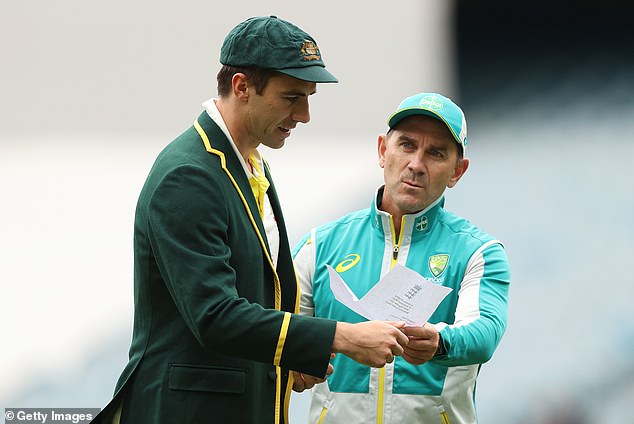 Former Australian Test coach Justin Langer (pictured with Pat Cummins) turned down a six-month contract extension in 2022 after having to reapply for his job