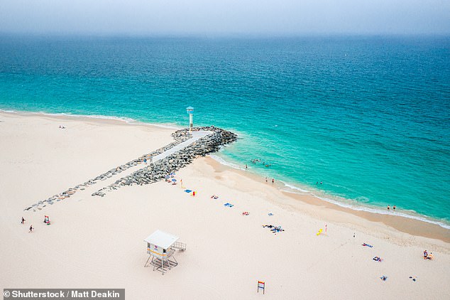 Cambridge City Council has turned off the hot water in public showers at Perth's City Beach (pictured) to combat overnight campers