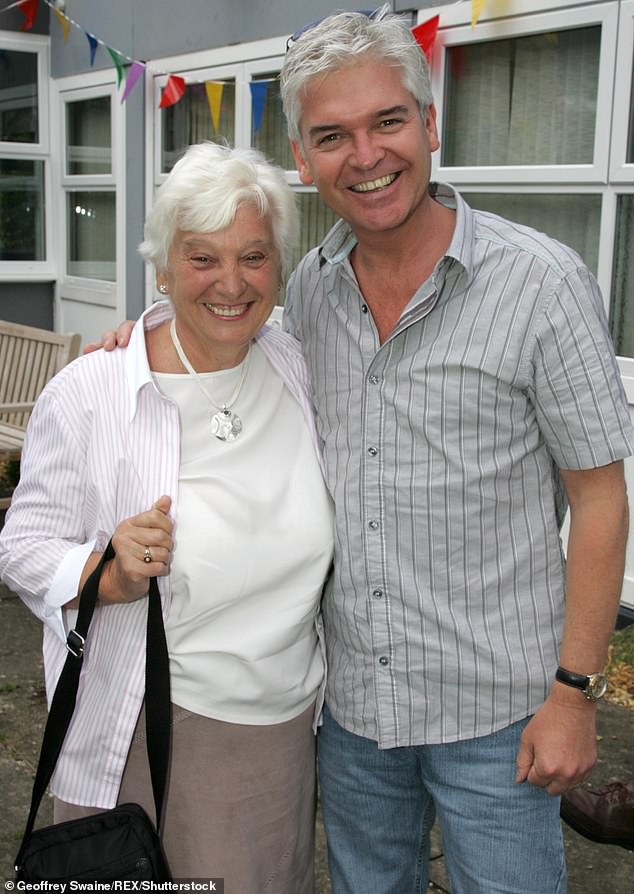 Schofield with his 'magnificent mother' Pat at the Wallingford Community Hospital summer party in Wallingford, Oxfordshire, in 2008