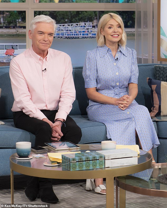 'Self-confessed liar' Phillip Schofield has been accused of 'blaming women' after reigniting his feud with former best friend Holly Willoughby (pictured May 2023)