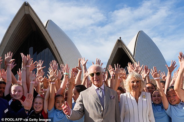 The sniper can be seen just above the crowd on one of the sails of the Sydney Opera House