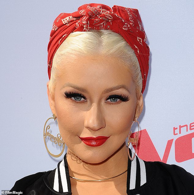 Dr. Brian Reagan, a plastic surgeon based in San Diego, California, noticed that she does not have the typical folds between her nose and mouth, and suggested that filler may have been involved. He made this comment while referencing a 2016 photo of Aguilera dressed in a Rosie the Riveter-inspired outfit