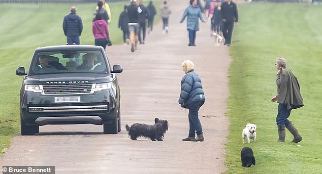 Prince Andrew stopped to talk to dog walkers in Windsor today as he returned from his morning run