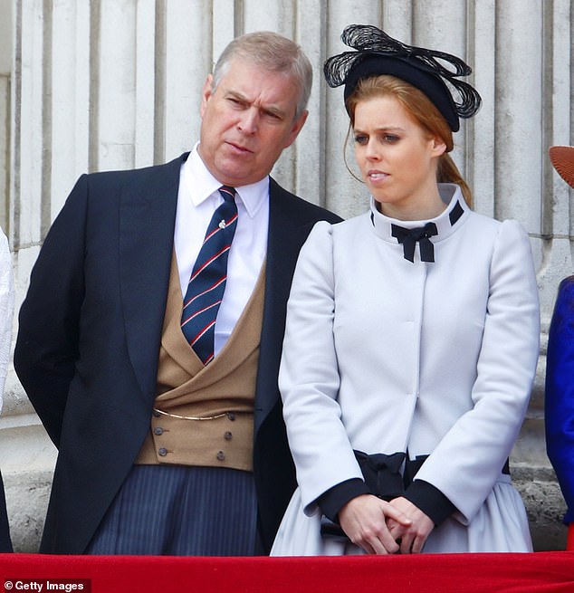 Princess Eugenie of York and Prince Andrew, Duke of York stand on the balcony of Buckingham Palace during the annual Trooping the Color Ceremony in 2013