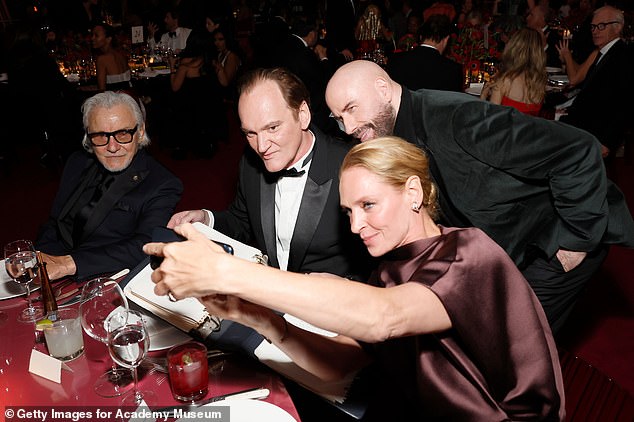 Pulp Fiction stars John Travolta and Uma Thurman reunited with director Quentin Tarantino at the Academy Museum Gala in Los Angeles on Saturday