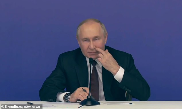 Vladimir Putin was caught on camera repeatedly itching his face during a visit to Ufa's new fencing centre