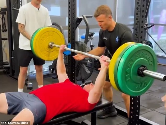 Queensland Premier Steven Miles has lifted 100kg off his chest during a gym challenge