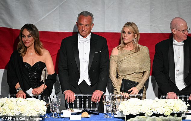 Robert F. Kennedy Jr. and Cheryl Hines looked tense as they attended the Al Smith charity dinner, their first formal event since RFK Jr's rumored sexting affair with Olivia Nuzzi